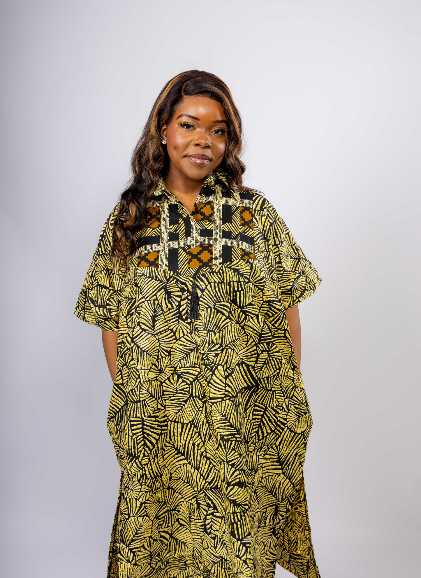 Cultural one-size-fits-all kaftan for women, featuring vibrant African print and modest loose design